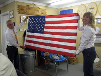 Kent Wakefield and Partner with flag