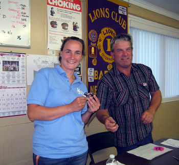 Photo: Sarah Reed receives her Lion statue from Barker Lions President Carl Stoloski