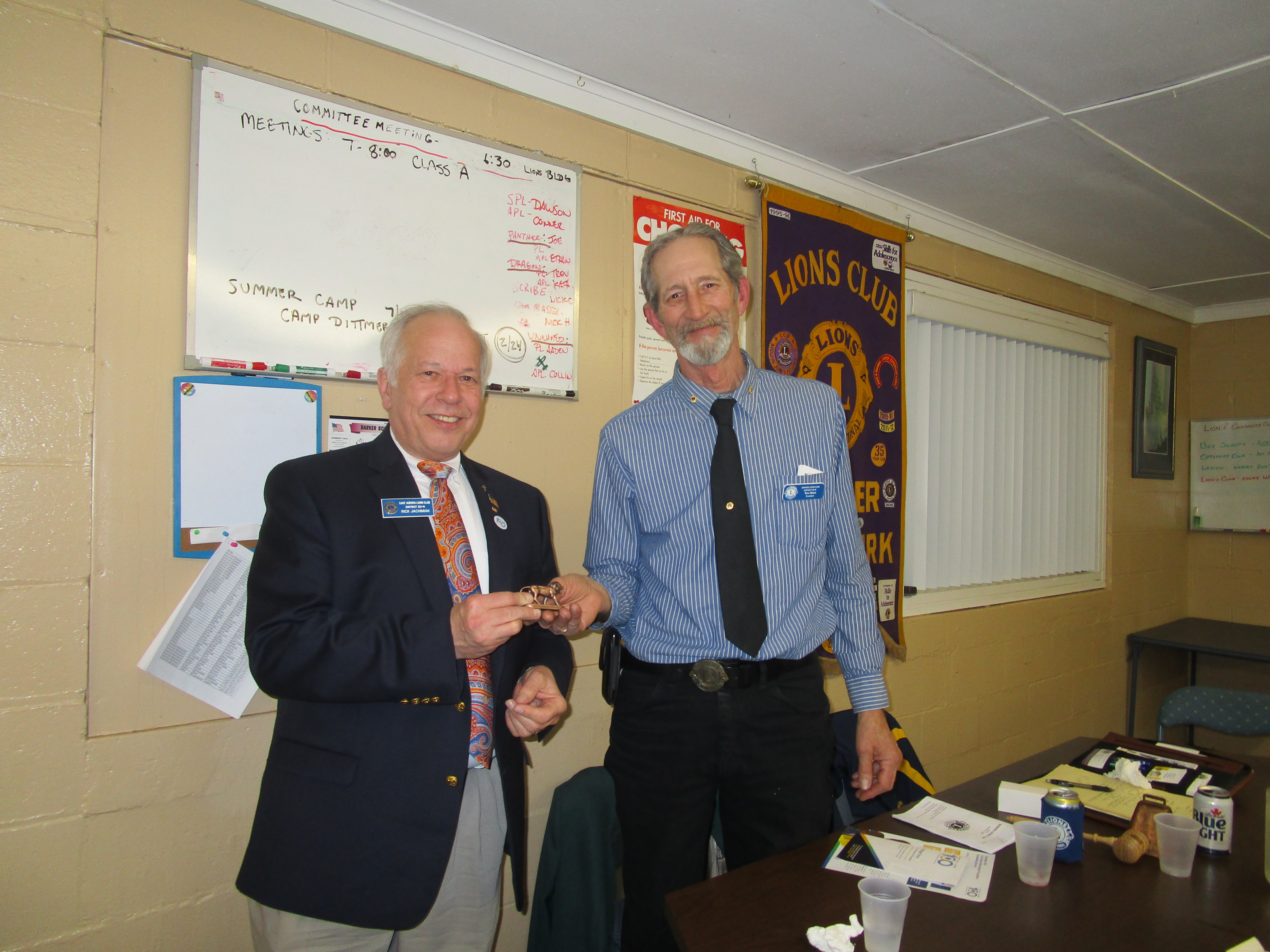 Lion Rich Jacimiak received a thank you gift from Barker Lion President Tom Ware.
